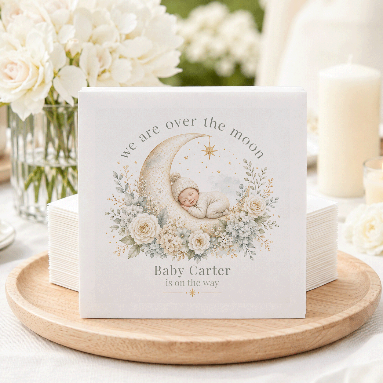 Napkins with sleeping baby on moon, "Baby Carter is on the way".
