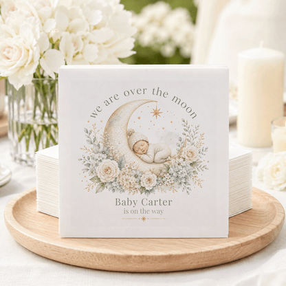 Napkins with sleeping baby on moon, "Baby Carter is on the way".