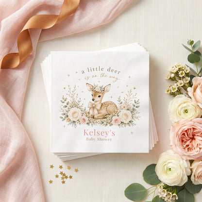Blush pink baby shower napkin with a fawn in a flower crown, pink roses, cream blooms and a personalized name