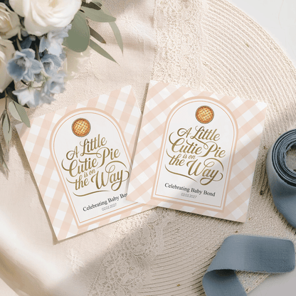 "A Little Cutie Pie is on the Way" baby shower favors with pie graphic.