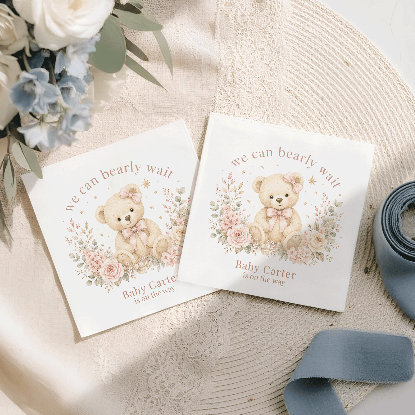 Two white baby shower cards with teddy bears and floral designs, stating "Baby Carter is on the way".