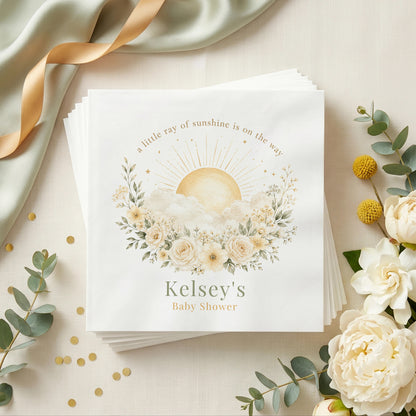 Cream and sage baby shower napkin with a golden sun, white clouds, ivory roses and a personalized name in sage green
