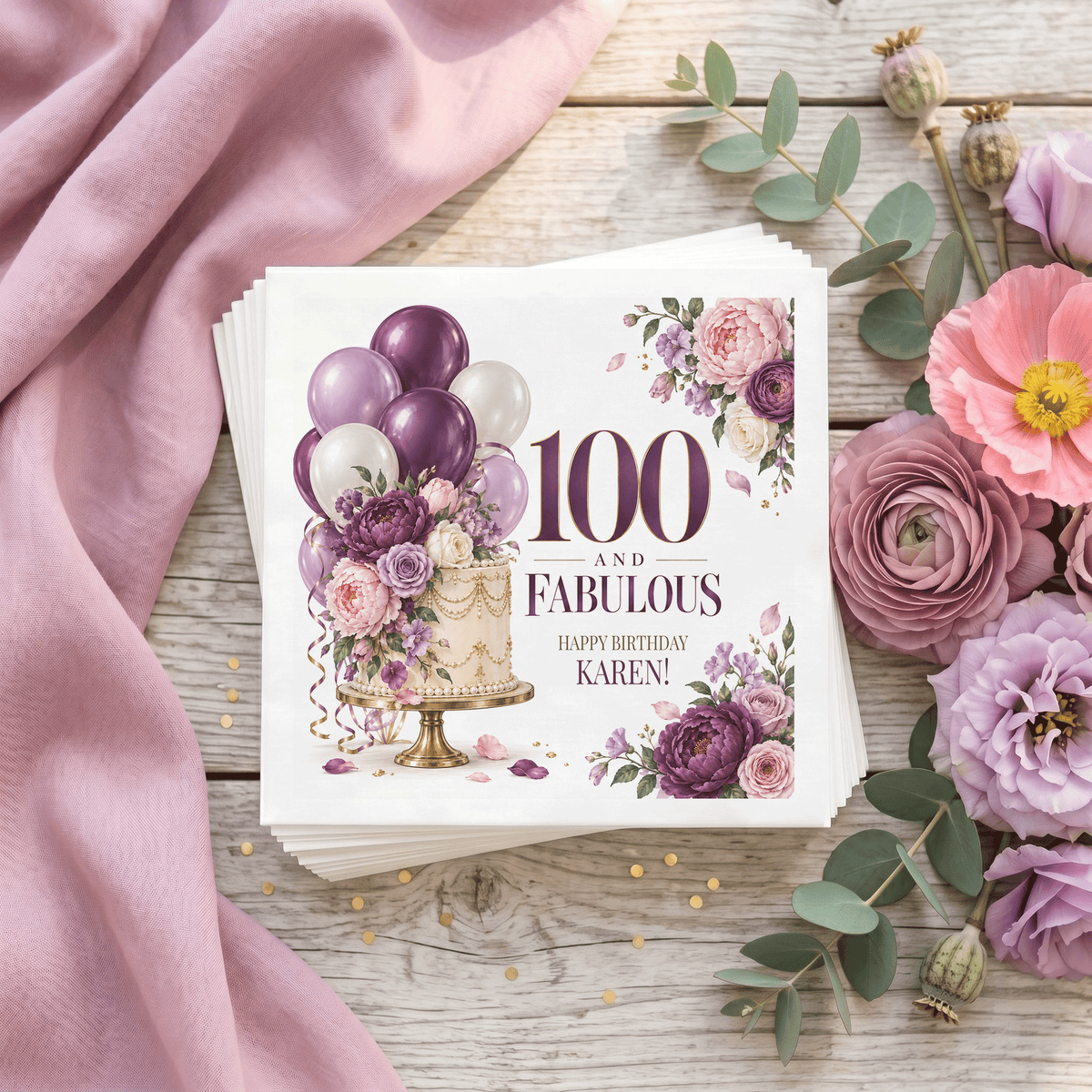 100th Birthday Balloon Napkins with a Purple Floral Cake