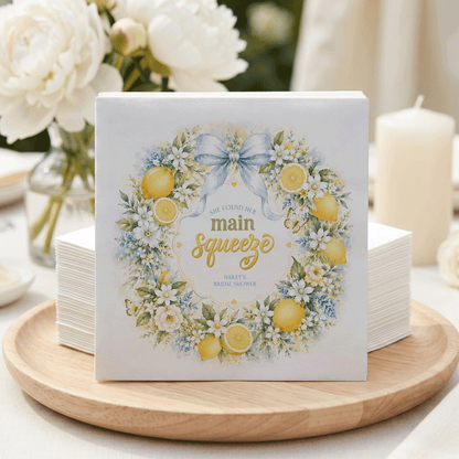Bridal shower napkins with lemons and flowers in a wreath design.