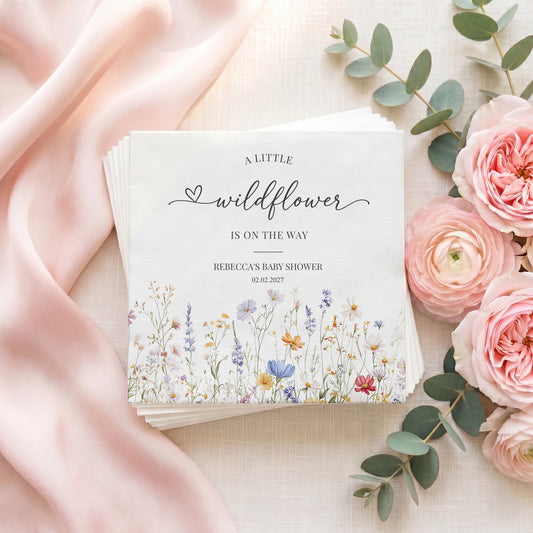 Baby shower invitation with floral design and text "A Little Wildflower".