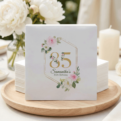 Napkins with "85" and "Samantha's 85th Birthday" in floral design.