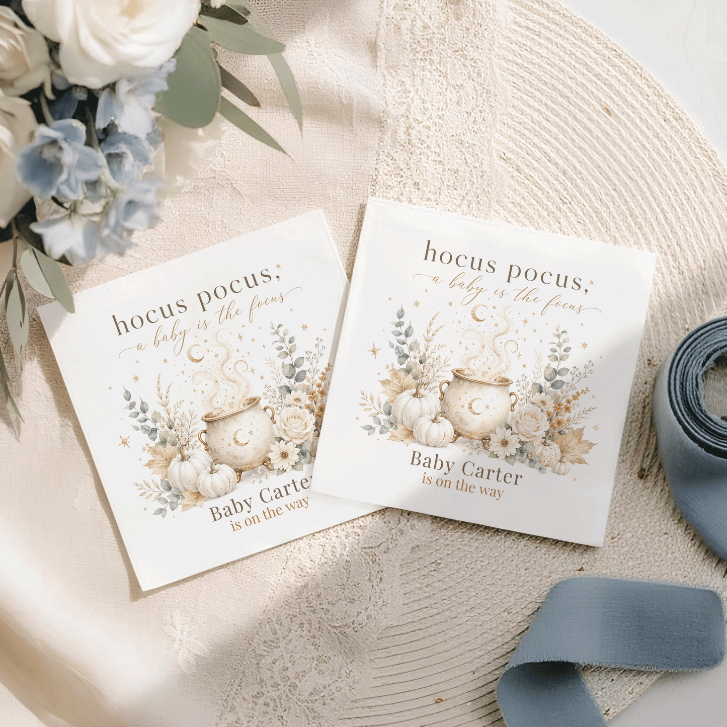 Two baby shower cards with "Hocus Pocus, a baby is the focus" text.