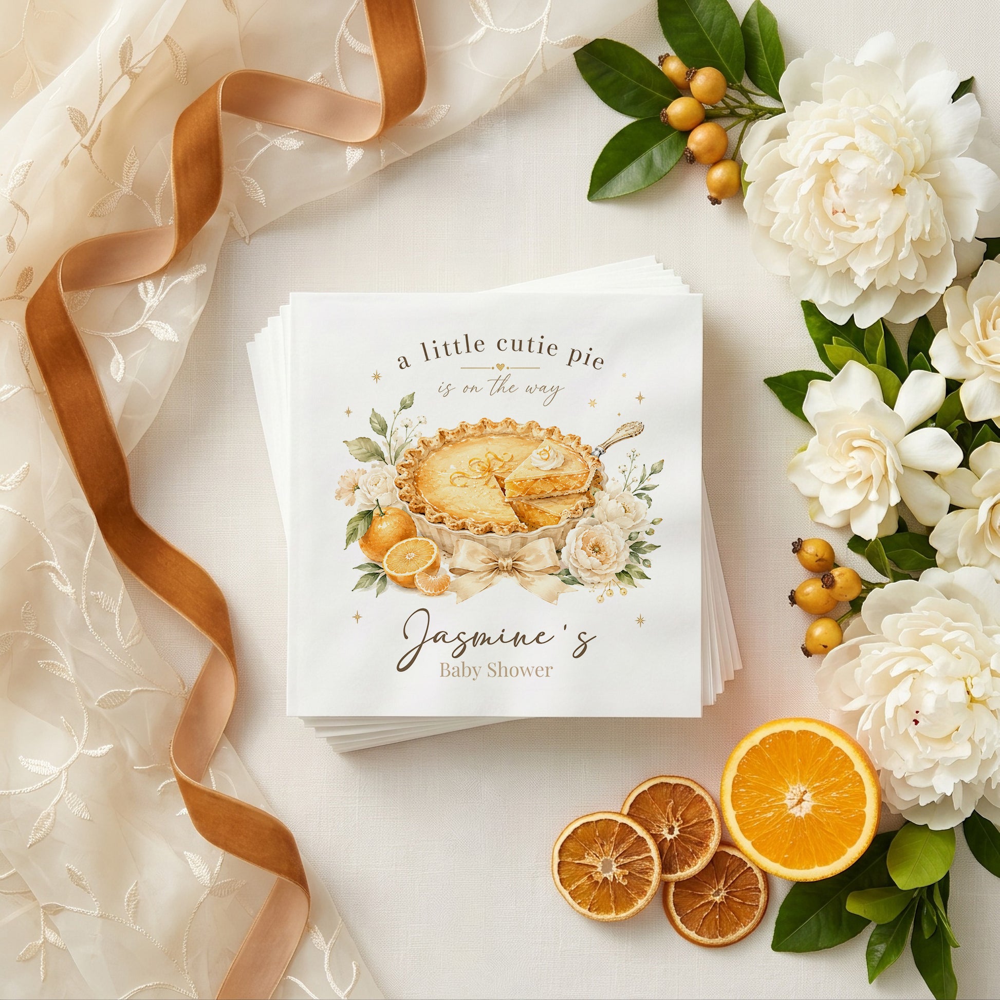 Cream and gold baby shower napkin with a golden pie, ivory peonies, citrus and personalized wording