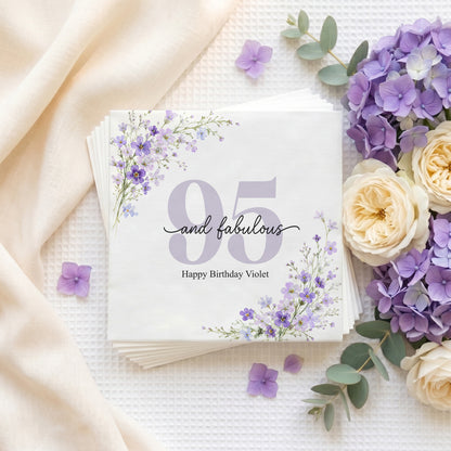 Napkins with "95 and fabulous, Happy Birthday Violet" and floral designs.