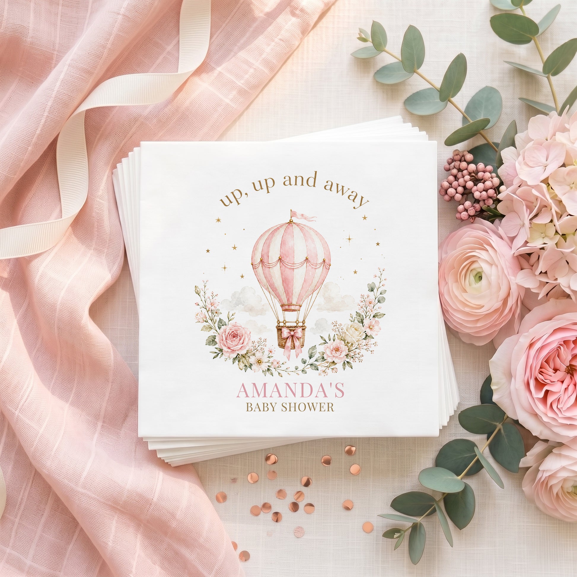Blush pink hot air balloon baby shower napkin with pink roses, gold stars and a personalized name in dusty pink