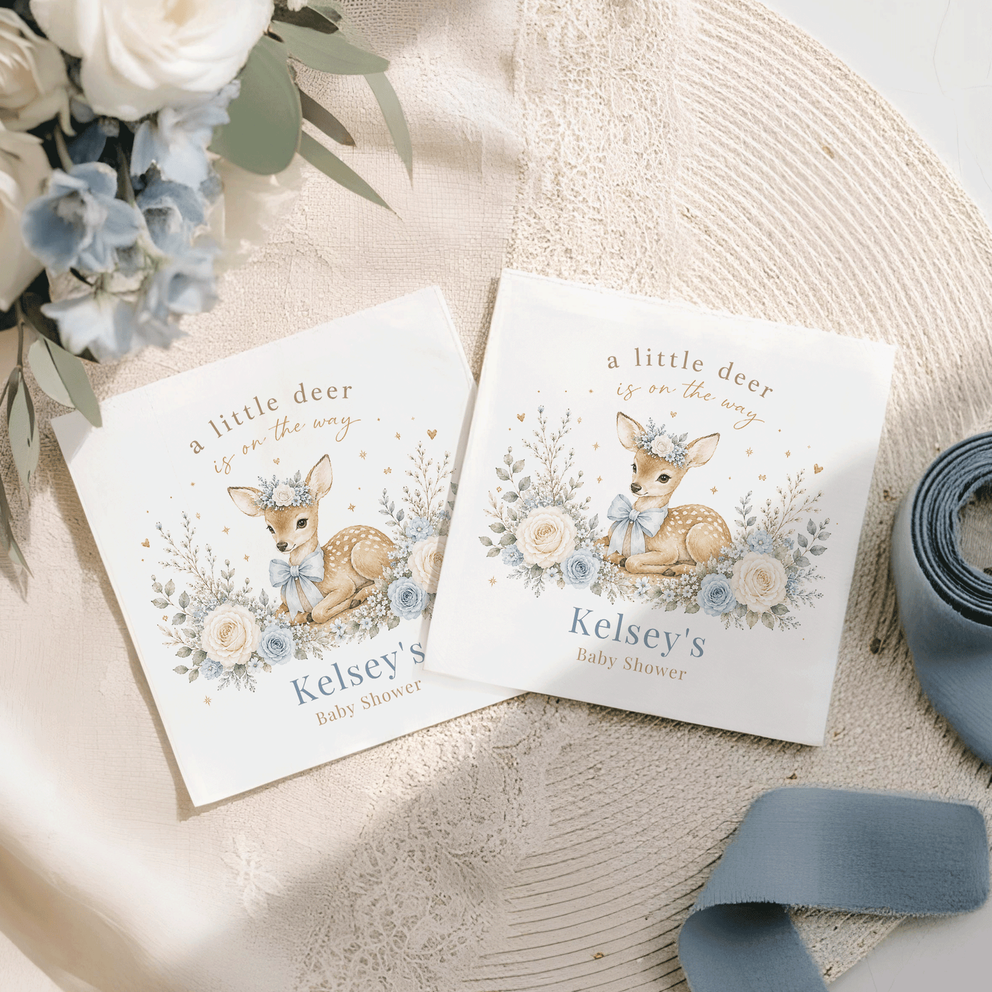 Baby shower invitations with a fawn illustration and text "Kelsey's Baby Shower".