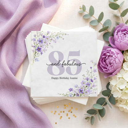 Set of napkins with "85 and fabulous Happy Birthday Joanne" and floral design.