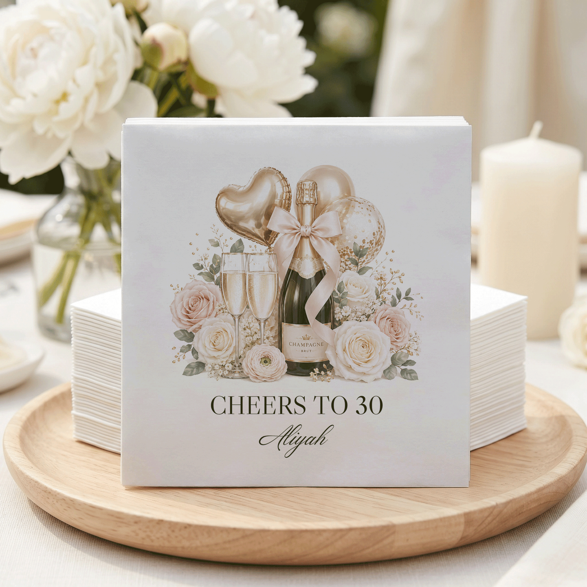 Napkins with "Cheers to 30 Aliyah" and champagne graphic.