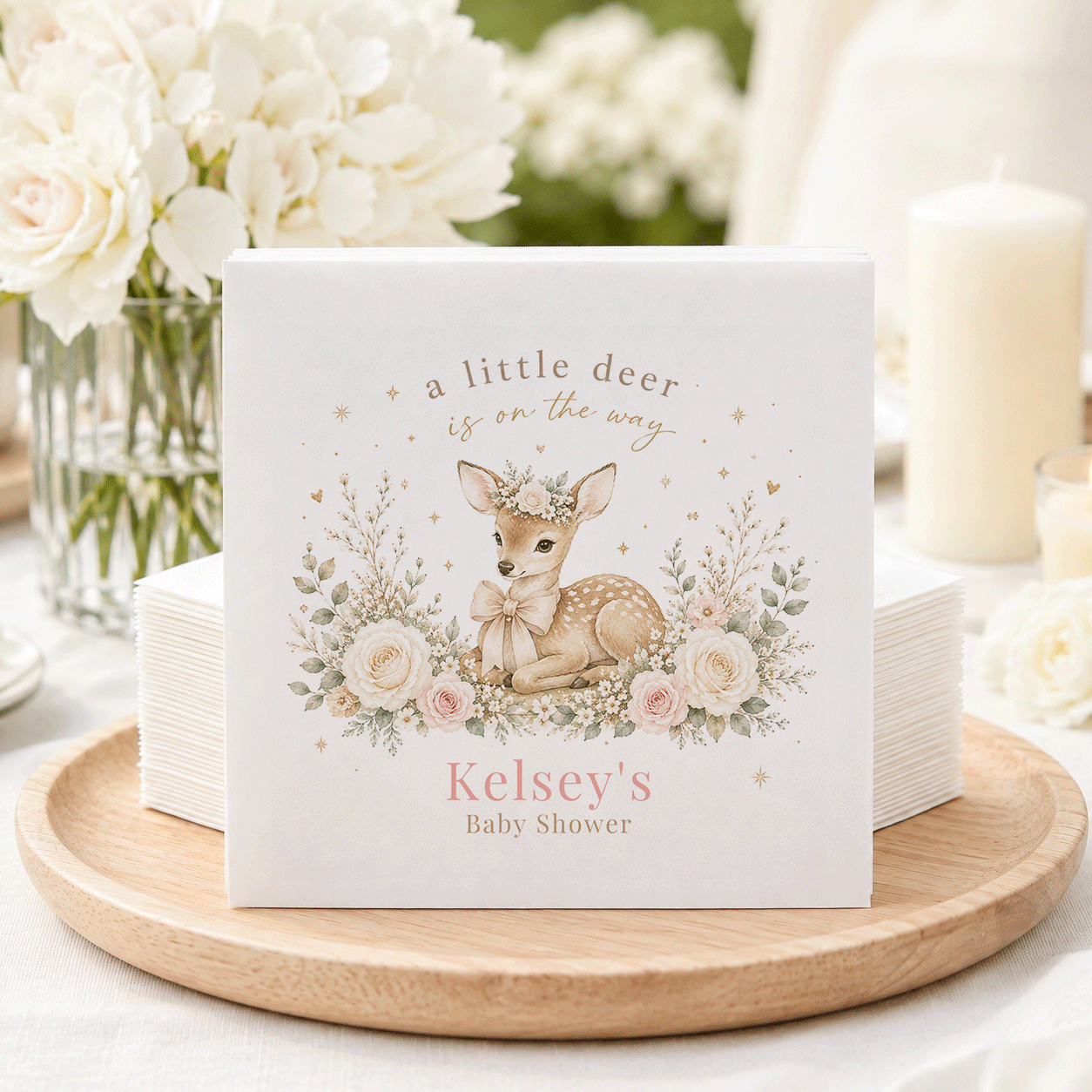Kelsey's Baby Shower napkins featuring a fawn with flowers and text "a little deer is on the way."
