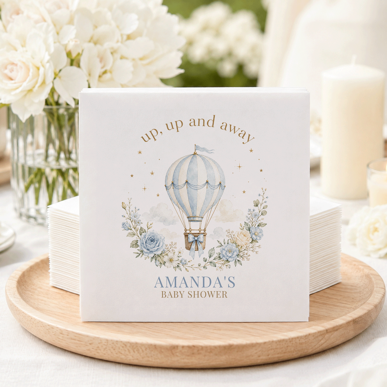 Napkins with hot air balloon, floral wreath, and "Amanda's Baby Shower" text.