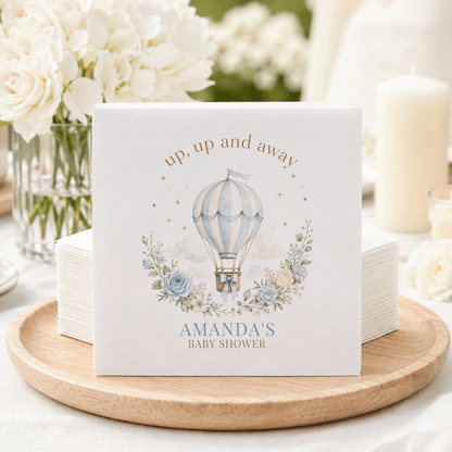 Napkins with hot air balloon, floral wreath, and "Amanda's Baby Shower" text.