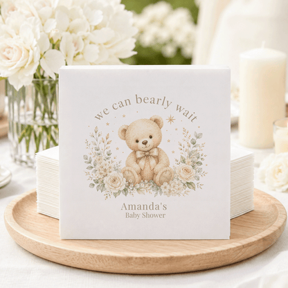 Teddy bear illustration with text "we can bearly wait" and "Amanda's Baby Shower".