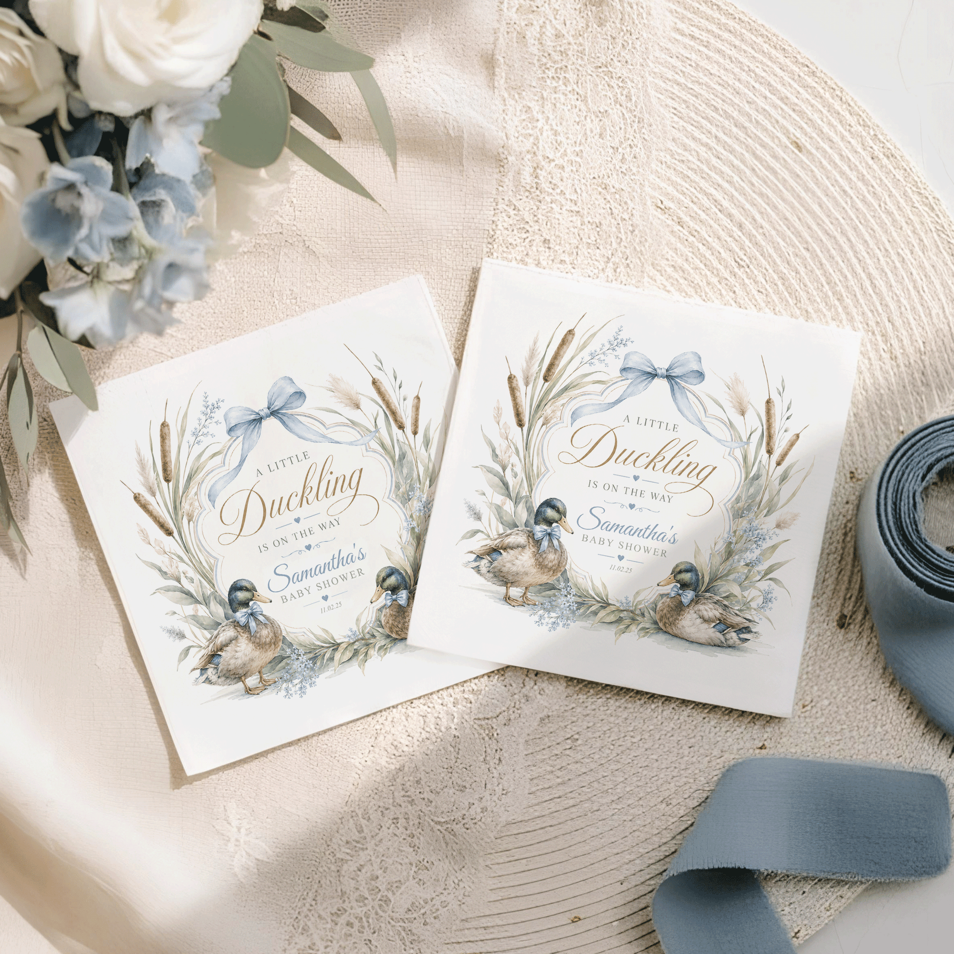 Two "A Little Duckling is on the Way" baby shower invitations with ducks.