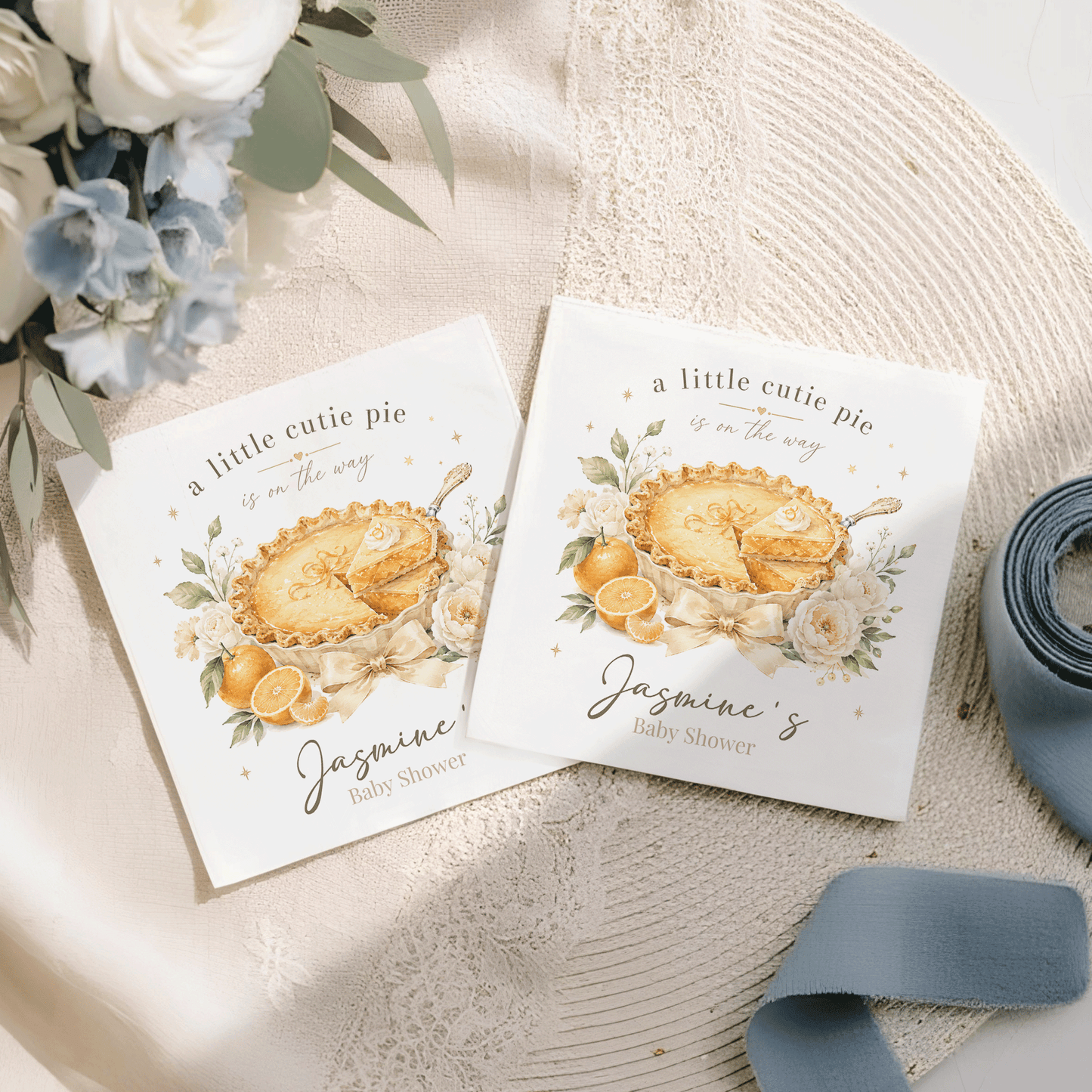 Two baby shower invitations feature a lemon pie illustration and text.