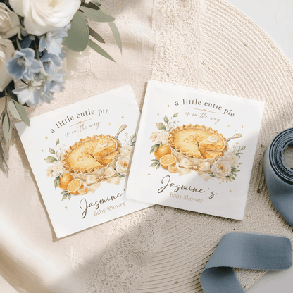 Two baby shower invitations feature a lemon pie illustration and text.
