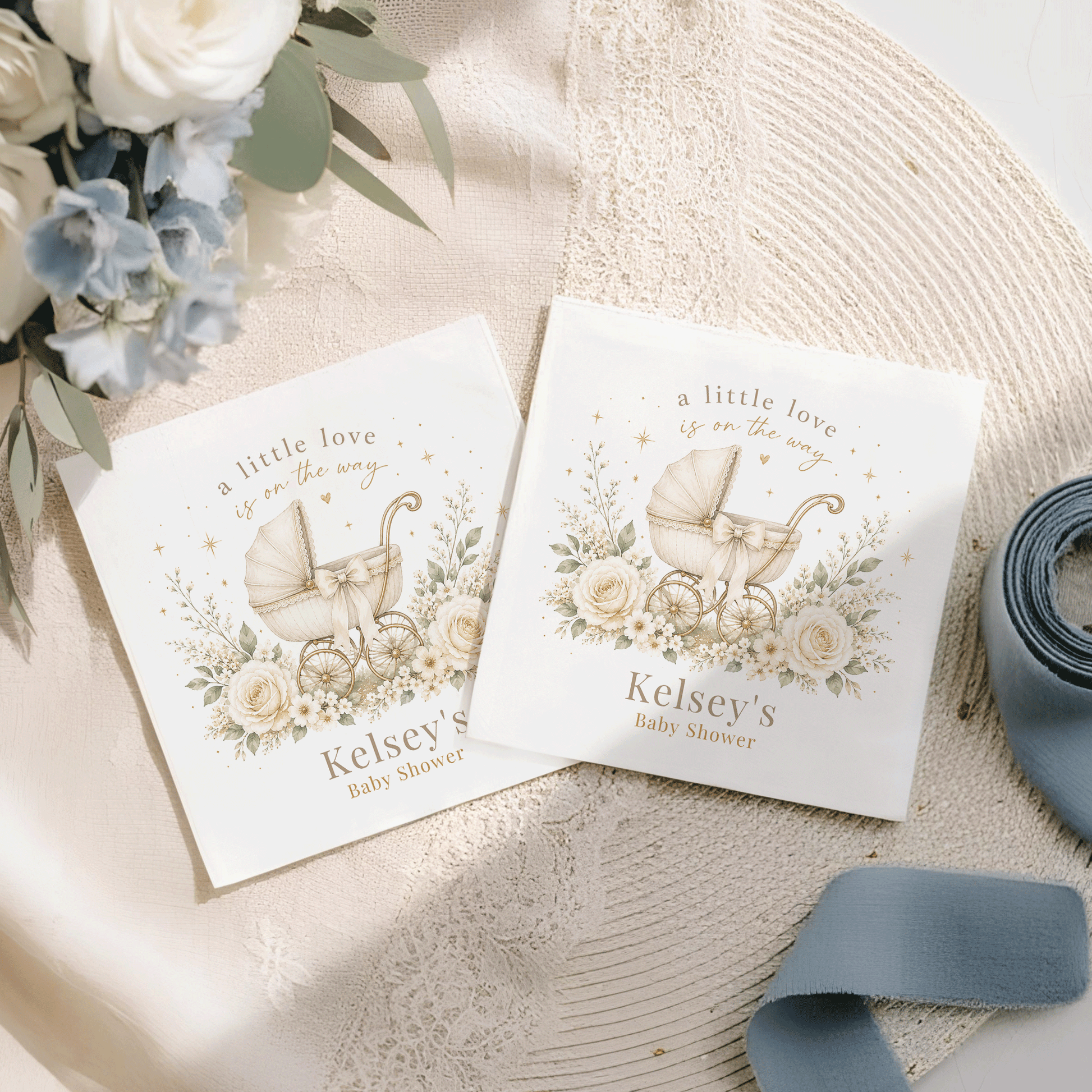 Two baby shower cards featuring a vintage stroller and floral design.