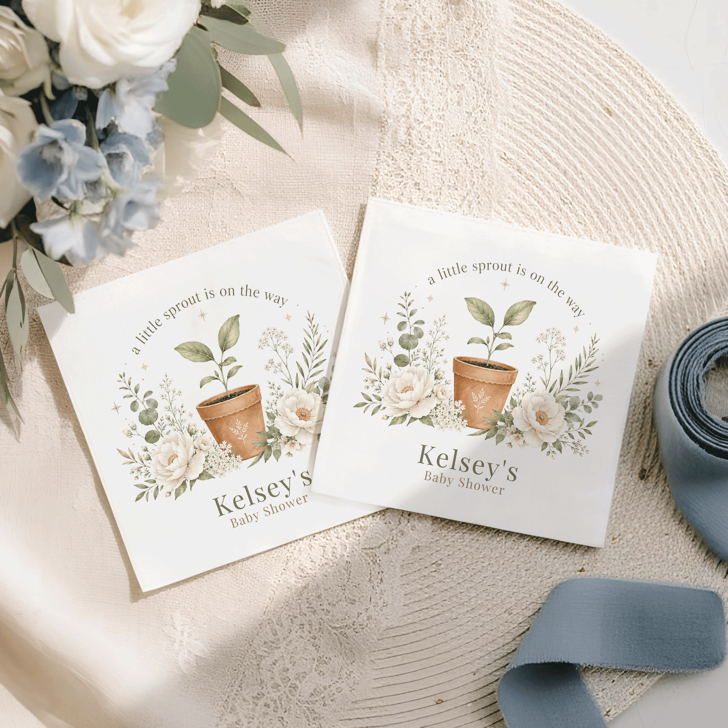 Two baby shower invitations with floral designs and text "Kelsey's Baby Shower".