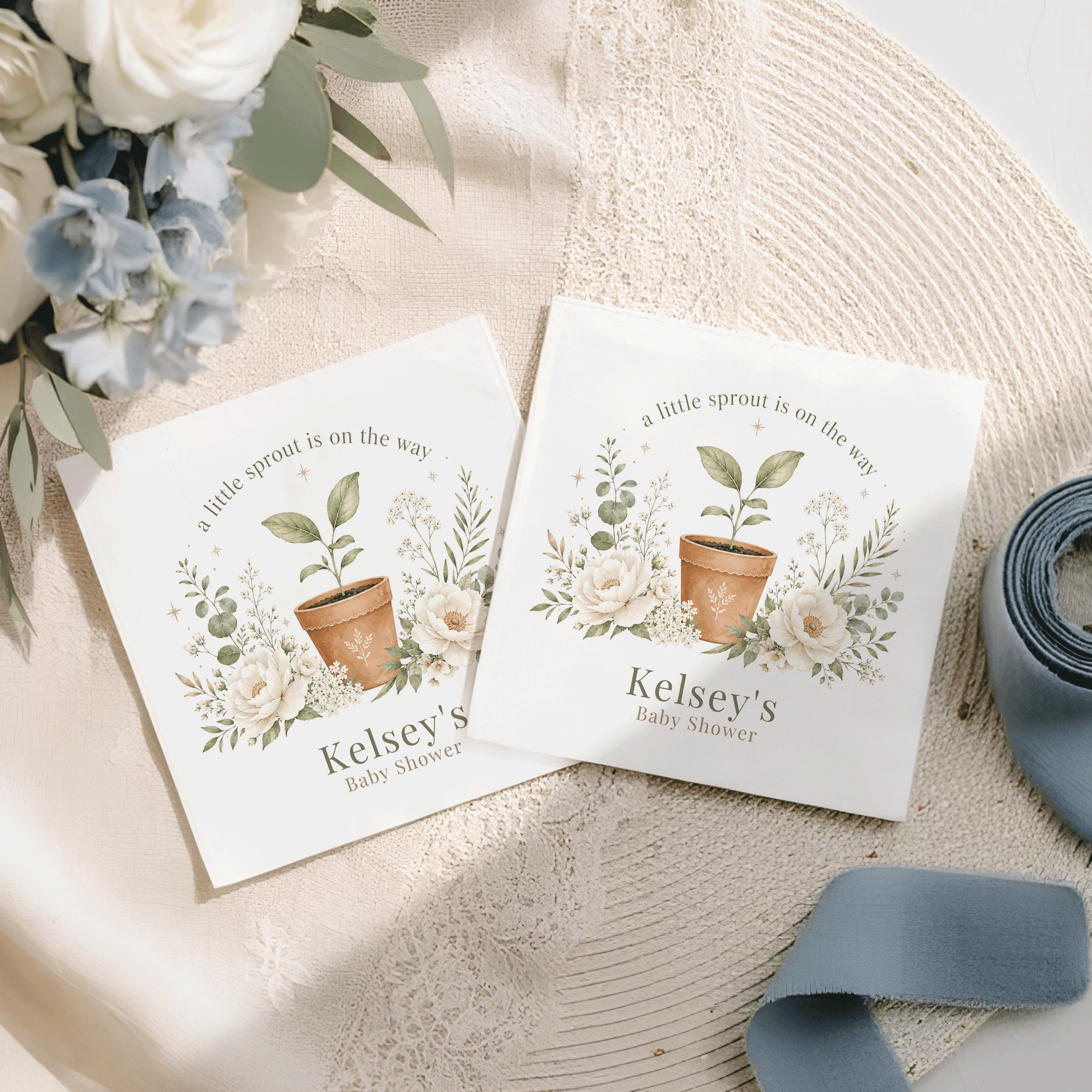 Two baby shower invitations with floral designs and text "Kelsey's Baby Shower".