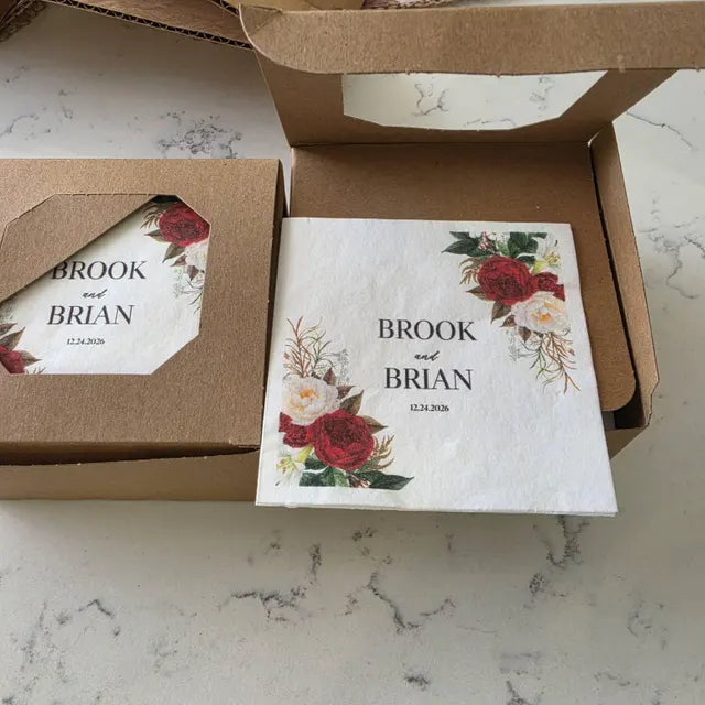Brook’s customer photo of personalized red and white floral wedding napkins