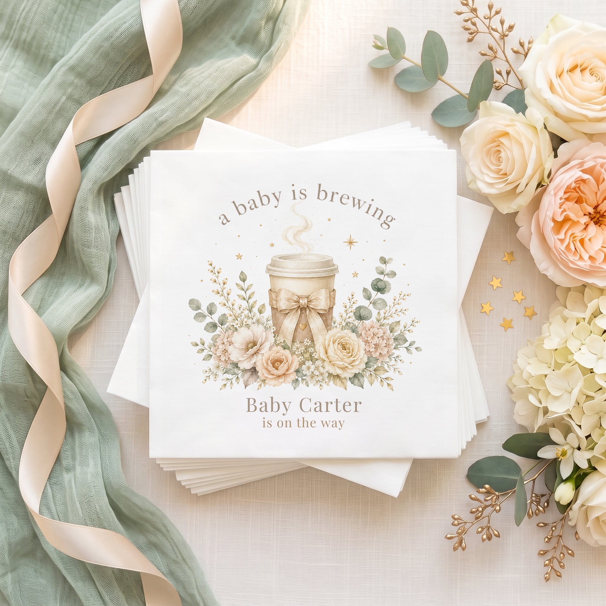 Personalized neutral A Baby Is Brewing baby shower napkins with coffee cup, ivory florals and custom event wording