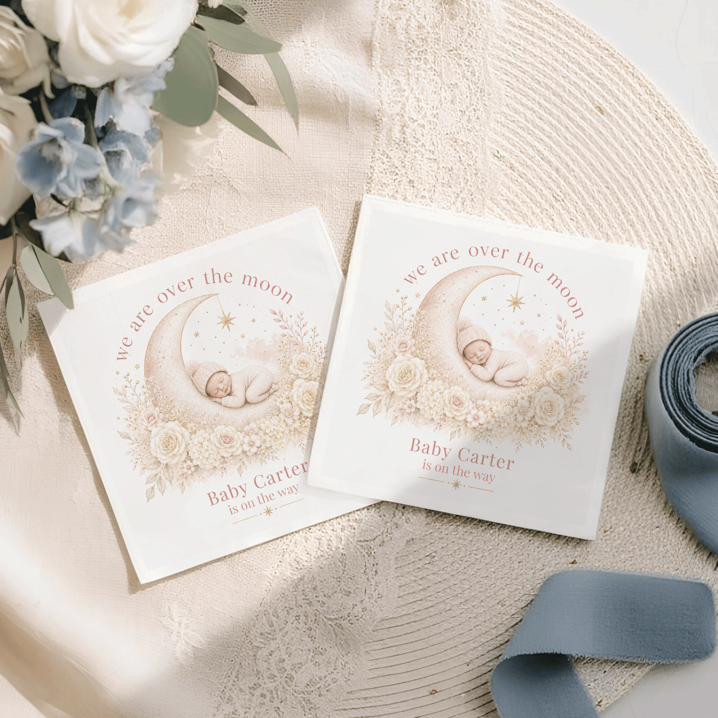Two cards feature a sleeping baby on a crescent moon with floral accents and text.