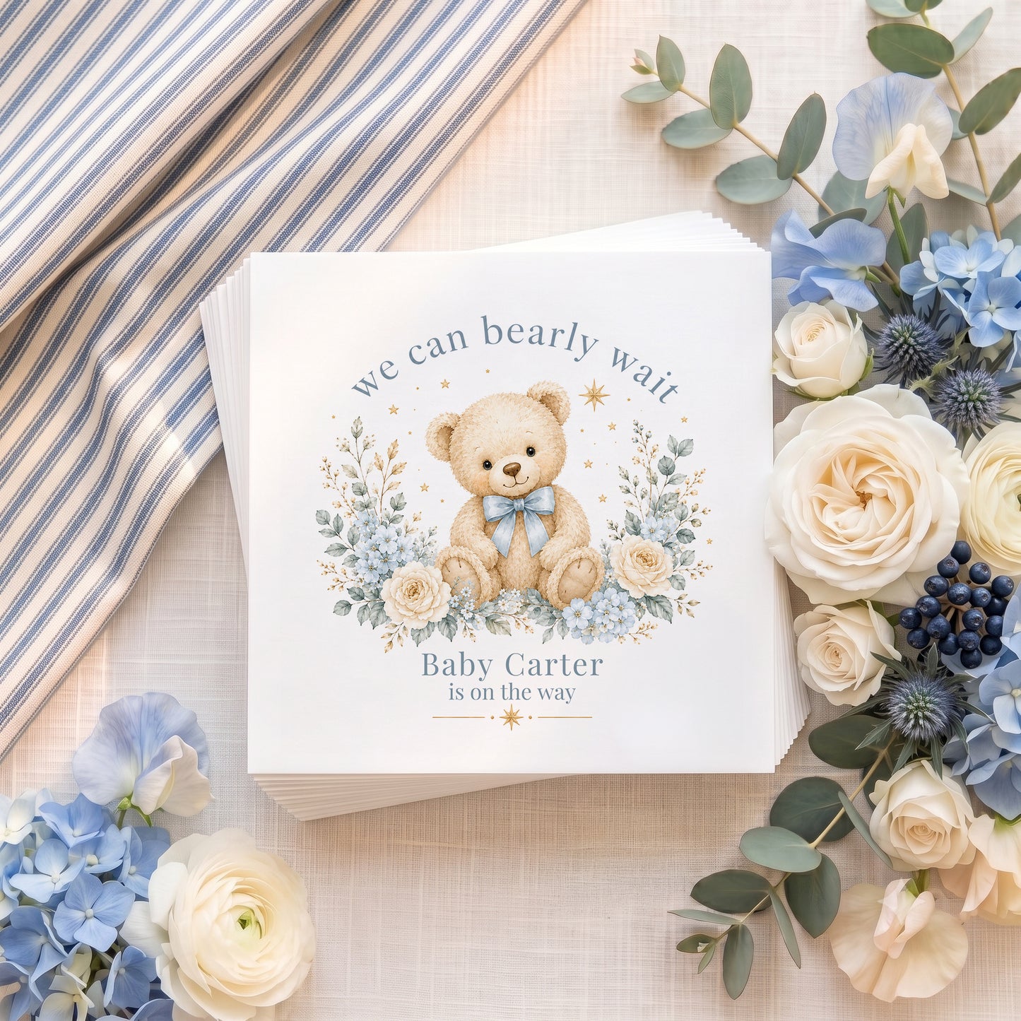 Personalized blue teddy bear baby shower napkins with We Can Bearly Wait wording and custom baby name