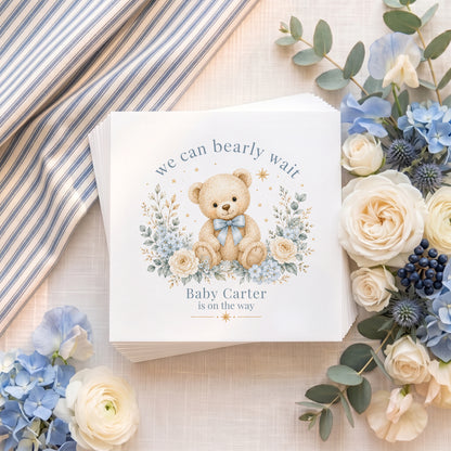 Personalized blue teddy bear baby shower napkins with We Can Bearly Wait wording and custom baby name