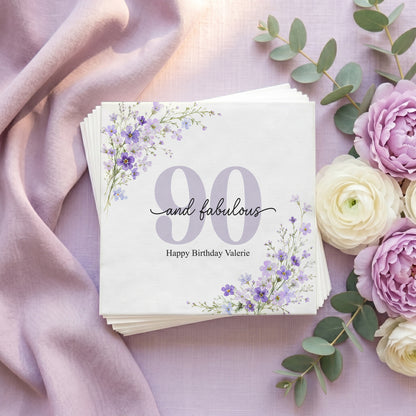 Napkins with "90 and fabulous Happy Birthday Valerie" and floral accents.