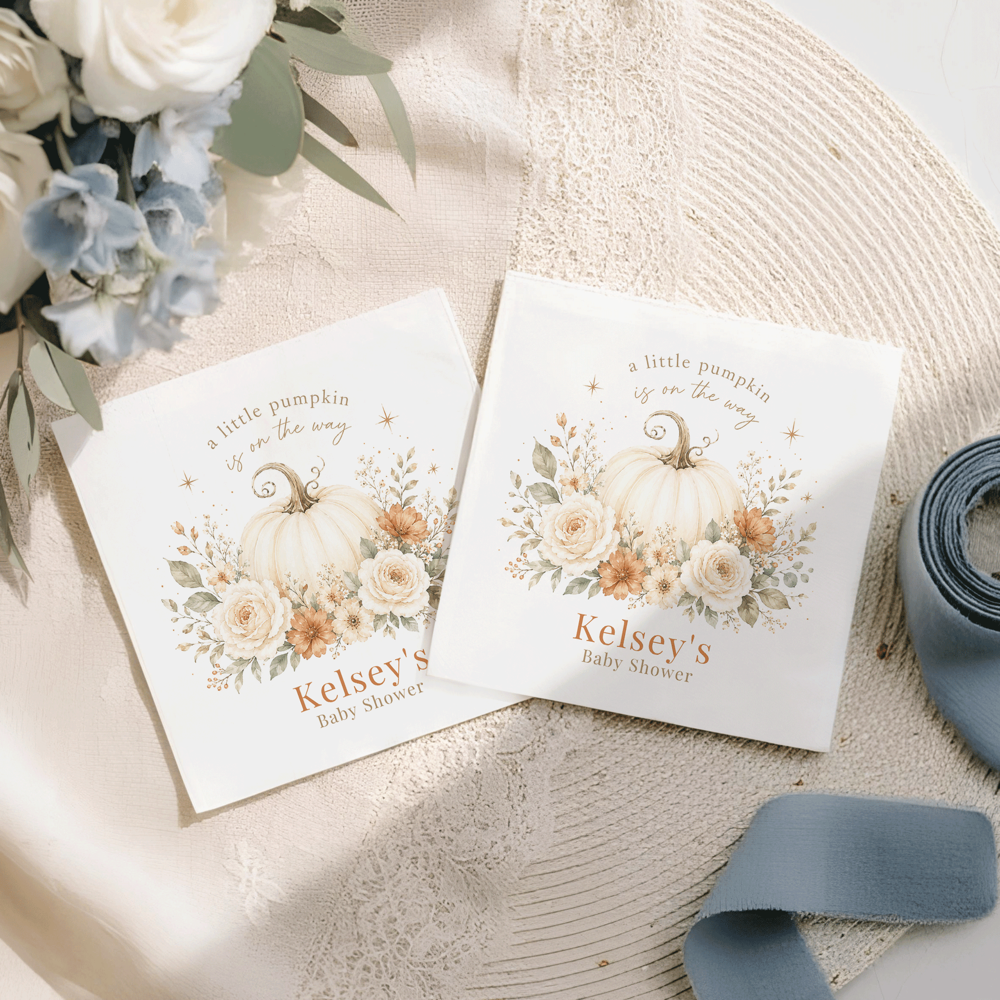 Two "a little pumpkin is on the way" baby shower napkins.