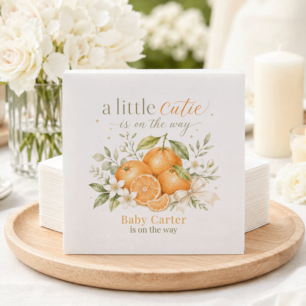 Napkins with "a little Cutie is on the way" and "Baby Carter is on the way".